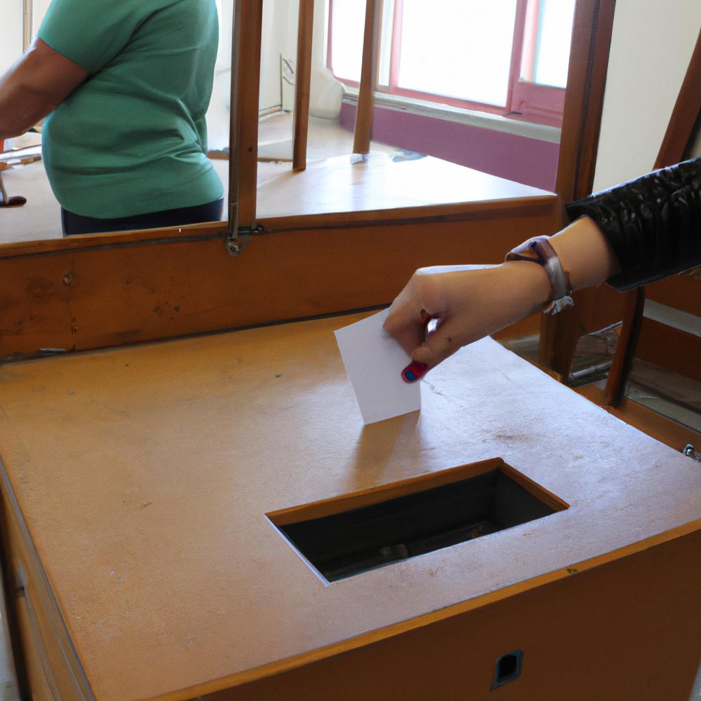 Person voting at a polling booth